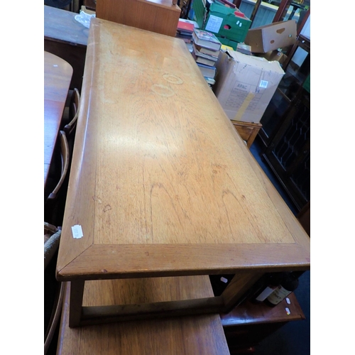 655 - A MID CENTURY TEAK RECTANGULAR COFFE TABLE faded