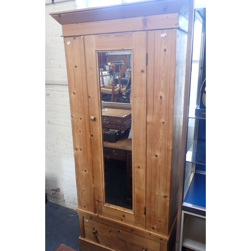 668 - AN EDWARDIAN STRIPPED PINE WARDROBE with mirror, 91cm wide (at cornice) 43cm deep , 197cm high