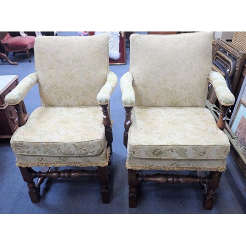 670 - A PAIR OF OAK FRAMED UPHOLSTERED OPEN ARMCHAIRS 60cm wide