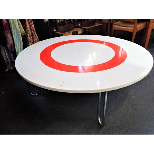 677 - A MODERN WHITE CIRCULAR COFFEE TABLE WITH RED CIRCLE DESIGN chrome 'U' shaped legs, 120cm dia.