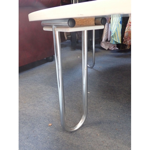 677 - A MODERN WHITE CIRCULAR COFFEE TABLE WITH RED CIRCLE DESIGN chrome 'U' shaped legs, 120cm dia.