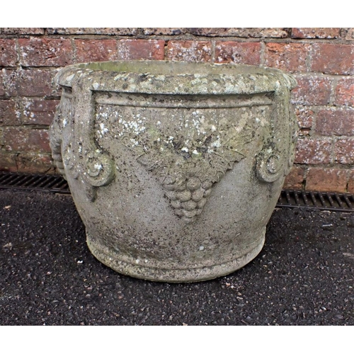 11 - A GARDEN PLANTER OF BELLIED FORM reconstituted, cast with grapes and scrolls 40cm diam