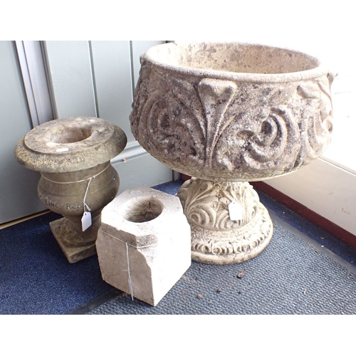 3 - THREE GARDEN URNS, ONE A MEMORIAL URN (lettering mostly picked out), one a stone vase holder the oth... 