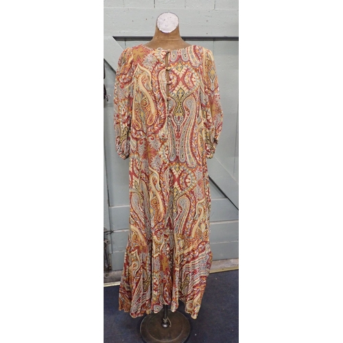 34 - BIBA: A VINTAGE FULL LENGTH DRESS with three quarter length sleeves (note: damage and old poor repai... 