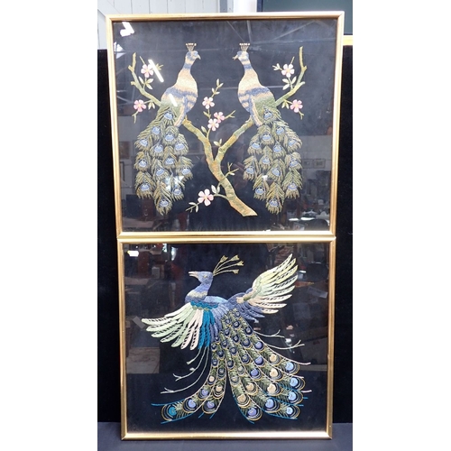 37 - A PAIR OF AESTHETIC STYLE FRAMED EMBROIDERIES OF PEACOCKS in gilt frames 56 x 58cm