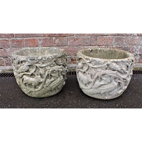 7 - A PAIR OF WEATHERED GARDEN PLANTERS of Romanesque design, reconstituted, 30cm diam