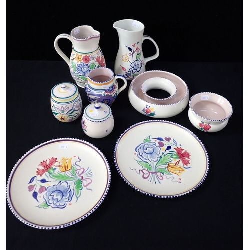 148 - A COLLECTION OF POOLE POTTERY traditionally painted (9)