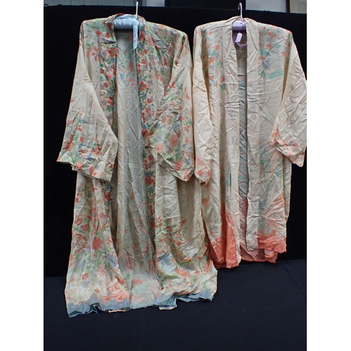 88 - A 1920S SILK 'KIMONO' HOUSECOAT printed with pagodas and other motifs, (minor moth damage), and anot... 