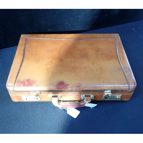 155 - A BIBA LEATHER BRIEFCASE with combination locks (number in office) (some wear to leather)