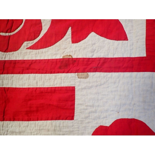 303 - A RED AND WHITE PATCHWORK QUILT, POSSIBLY AMERICAN hand-stitched 229 x 237cms (some marks and staini... 