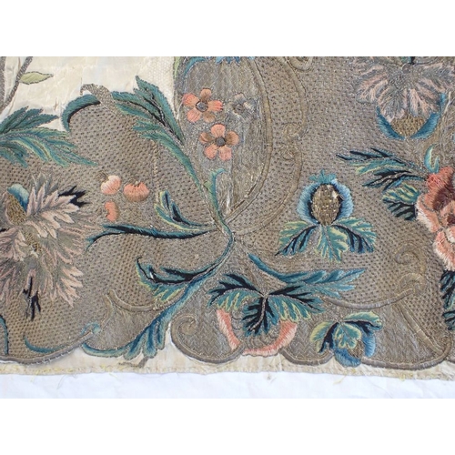 307 - AN 18TH CENTURY EMBROIDERED PANEL possibly fragment of bed hanging 104 x 47cms (damaged,couched onto... 