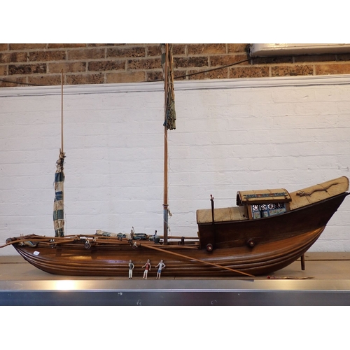 313 - AN EARLY 20TH CENTURY MODEL CHINESE JUNK with carved crew, purchased c.1920 by a Midshipman Tulloch,... 