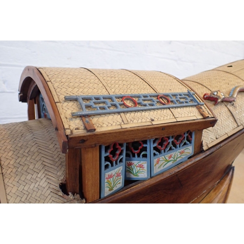 313 - AN EARLY 20TH CENTURY MODEL CHINESE JUNK with carved crew, purchased c.1920 by a Midshipman Tulloch,... 