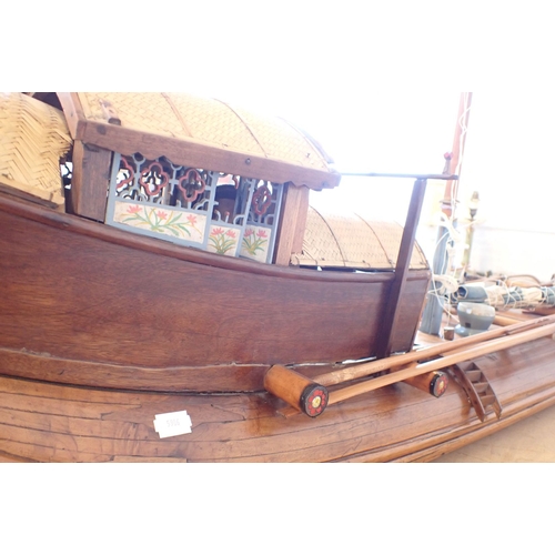 313 - AN EARLY 20TH CENTURY MODEL CHINESE JUNK with carved crew, purchased c.1920 by a Midshipman Tulloch,... 