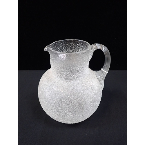 319 - A VICTORIAN ICE-EFFECT GLASS WATER JUG 23cm high