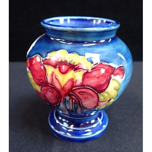 365 - MOORCROFT: AN ORCHID DECORATED SQUAT VASE with original paper label 'By appointment to the Late Quee... 