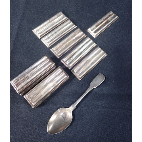 441 - CHRISTOFLE: EIGHTEEN 'ONDULATION' BY LUC LANEL KNIFE RESTS (not boxed), and a silver teaspoon