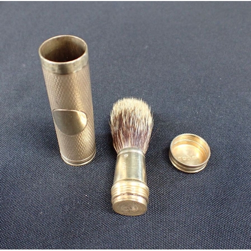 454 - A VICTORIAN SILVER-GILT SHAVING BRUSH with engine turned decoration