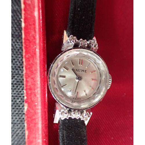 515 - A 9CT WHITE GOLD AND DIAMOND BAUME COCKTAIL WATCH