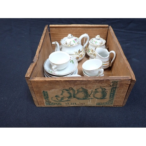 555 - A CHILD'S TEA SERVICE late 19th century, continental, with part of the original wooden box, and othe... 