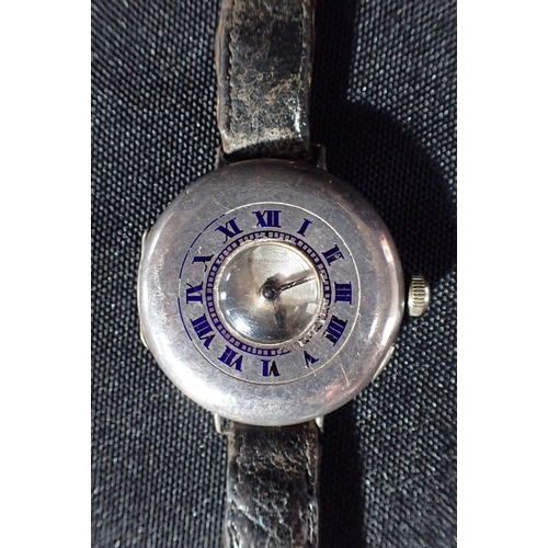 595 - MARCFAVRE & CO: A SILVER TRENCH WATCH half hunter styles