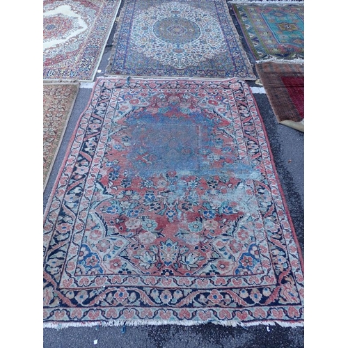 801 - AN OLD MESHAD RUG (MOTH DAMAGED) 138 x 207cm, and five various machine-made rugs (6)