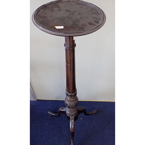 815 - A GEORGE III STYLE MAHOGANY TORCHERE with tripod base106cm high