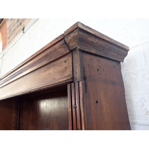 831 - AN EARLY 19TH CENTURY MAHOGANY LIBRARY BOOKCASE 240cm high, 160cm wide (altered, for restoration)