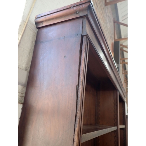 831 - AN EARLY 19TH CENTURY MAHOGANY LIBRARY BOOKCASE 240cm high, 160cm wide (altered, for restoration)