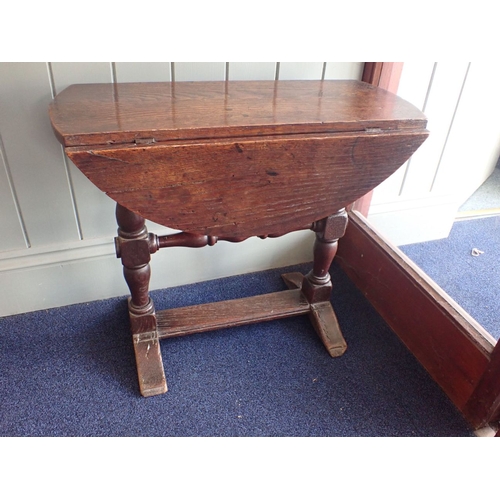 878 - AN OCCASIONAL TABLE , THE TIMBER SALVAGED FROM THE ROOF OF WINDSOR CASTLE one of the drop-flaps inci... 