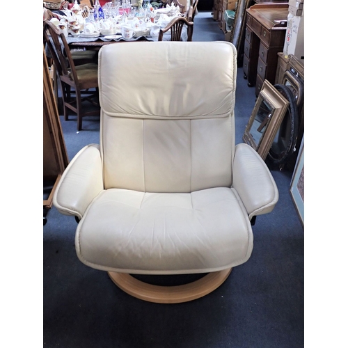 881 - A 'STRESSLESS' CREAM LEATHER CHAIR