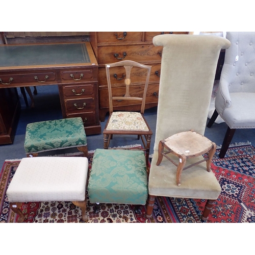 888 - THREE UPHOLSTERED FOOTSTOOLS WITH CABRIOLE LEGS a Victorian Prie Dieu chair, an Edwardian occasional... 