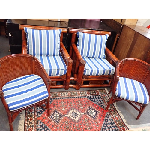 896 - A PAIR OF SUBSTANTIAL CHINESE BAMBOO ARMCHAIRS with striped cushions 90cm wide, and two similar tub ... 