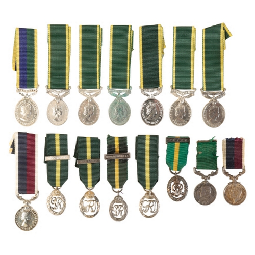 128 - A COLLECTION OF MINIATURE TERRITORIAL DECORATIONS AND MEDALS Volunteer Force Long Service Medal (Ind... 