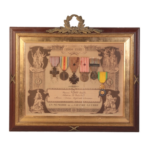 199 - A WWI FRENCH GROUP OF MEDALS TO LEOPOLD from the 175th Artillery, framed and glazed with French War ... 