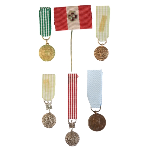 254 - PORTUGAL AND SPAIN. A COLLECTION OF MINIATURE ORDERS AND MEDALS Portugal. Medal for the Coronation o... 