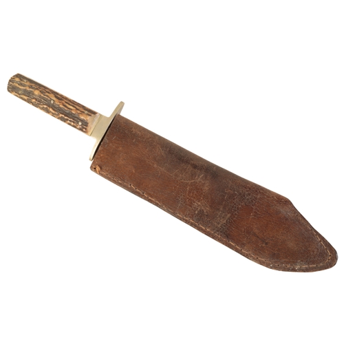 406 - A BOWIE KNIFE by George Wostenholm & Sons Ltd, Washington Works of Sheffield, with antler grip handl... 