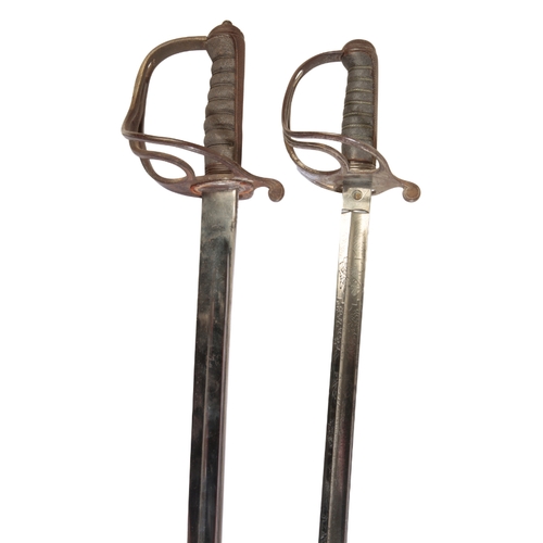 460 - AN OFFICER'S DRESS SWORD by D. Stewart, with floral etched blade, steel hilt and sharkskin wired gri... 