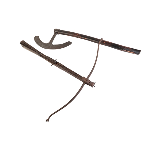 468 - A 19TH CENTURY CROSSBOW with walnut stock, steel trigger guard and back sight, 70cm long; and a 19th... 