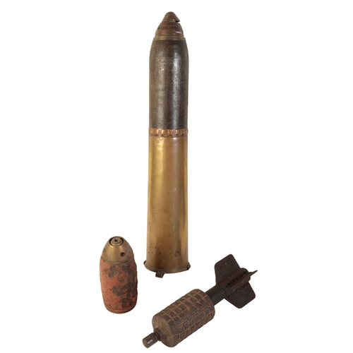 473 - A WWI AIRCRAFT BOMB 70cm long; a WWI mortar round; a WWI bomb shrapnel shell with lid, dated 1917, s... 