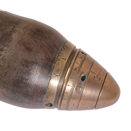 474 - A 1962 BRASS MILITARY SHELL stamped to the base with military crows foot ECC 5, 64cm long; and one o... 