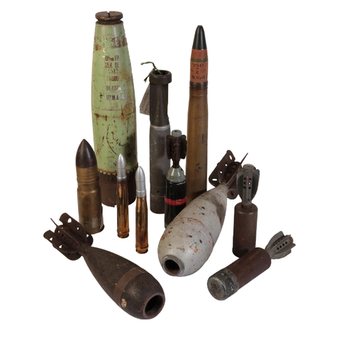 476 - A SMALL COLLECTION OF BRASS ARTILLERY SHELLS airplane bombs, artillery fuse and anti-tank rounds, an... 