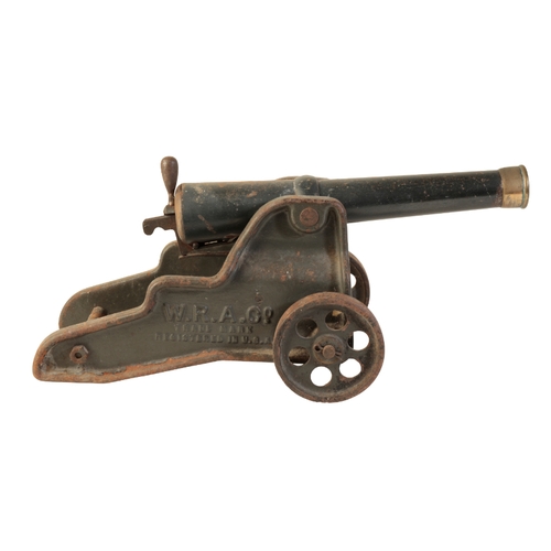 477 - A STARTING CANNON BY W.R.A. CO., USA with steel green-painted carriage and a single-stepped brass en... 