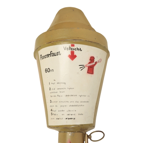 478 - A REPRODUCTION PANZERFAUST perfect for display or a reenactor, tan in colour with the instructions o... 