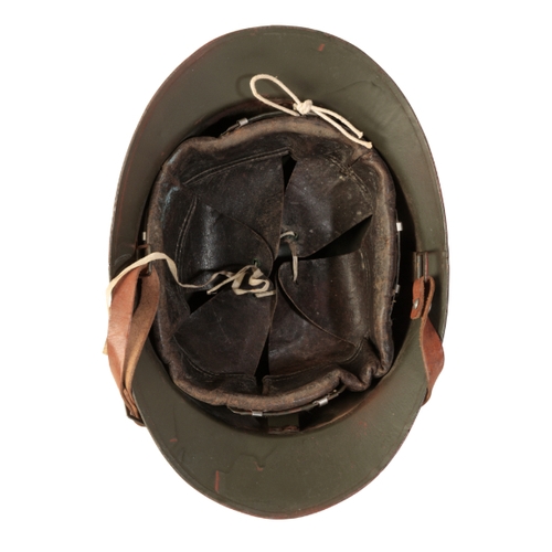 488 - A FRENCH ADRIAN HELMET WITH 'RF' BADGE in green olive paint with 'RF' badge. The helmet post WWI, li... 