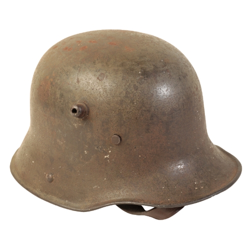 490 - A WWI M16 GERMAN HELMET with leather lining and chin-piece.