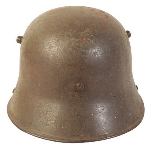 490 - A WWI M16 GERMAN HELMET with leather lining and chin-piece.