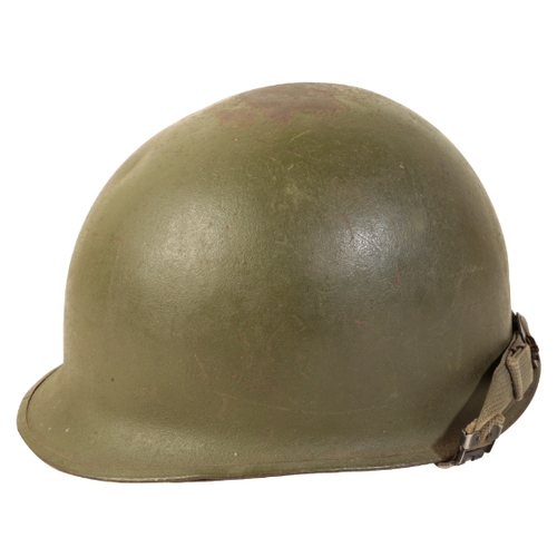 491 - A WWII AMERICAN M1 HELMET with original liner and canvas chin-strap.