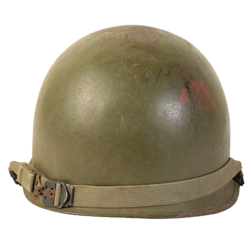 491 - A WWII AMERICAN M1 HELMET with original liner and canvas chin-strap.