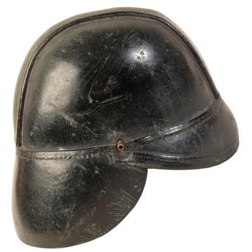 492 - A WWI BRITISH LEATHER FIRE HELMET with original leather lining and leather chin strap, size 6 7/8, w... 